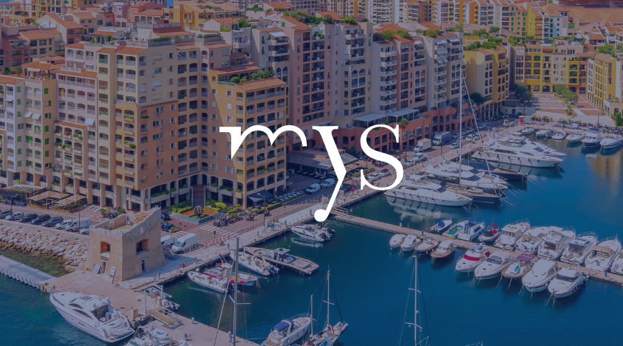 Maritime exhibition booth at Monaco Yacht Show 2025 featuring MariApps branding and maritime software solutions display.